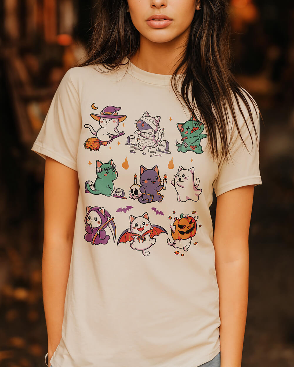 T-shirt print with nine cats in humorous Halloween costumes