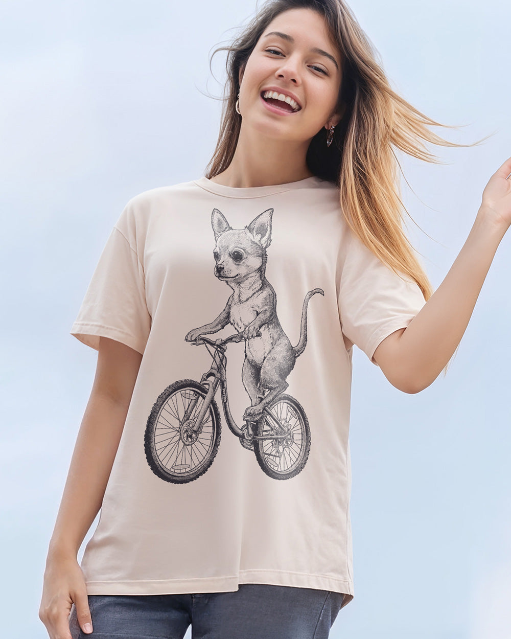 Chihuahua cycling on a vintage bicycle engraving-style T-shirt design