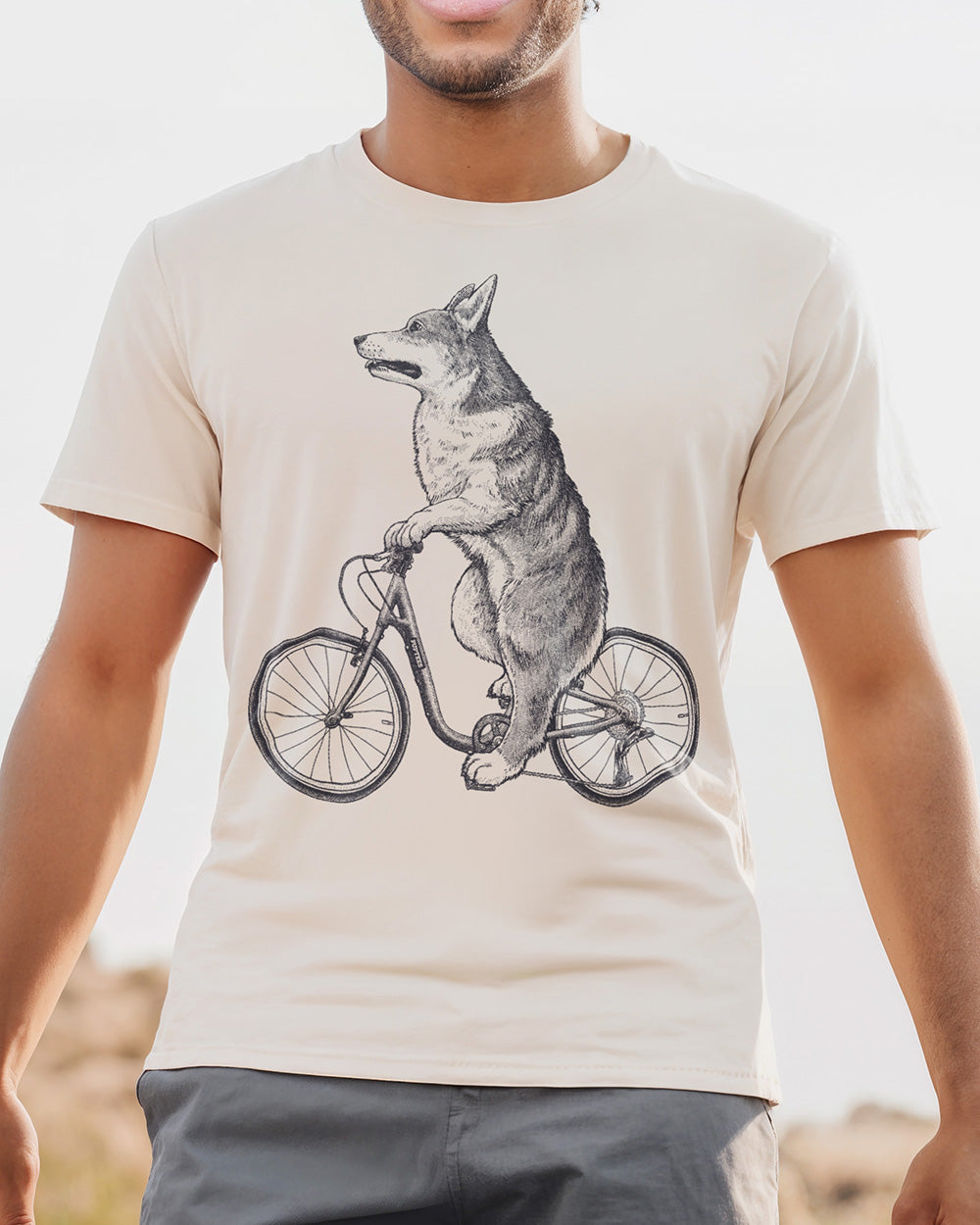 Retro black and white B&W Corgi on a bicycle graphic tee design