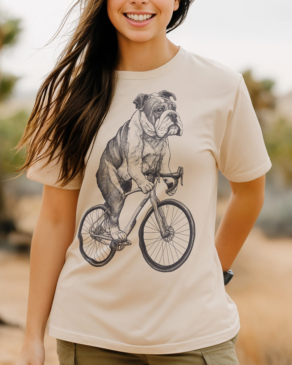 English Bulldog cycling design on a classic and minimalist natural colored T-shirt
